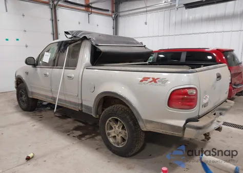 2002 Ford F-150 Lariat/Xlt z USA, uszkodzony, nr VIN 1FTRW08L12KB70492